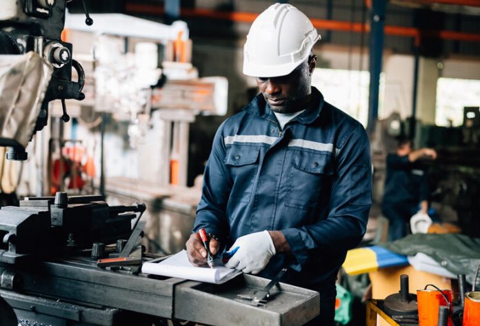 Professional,Male,Industrial,Worker,In,White,Hard,Hat,Working,At